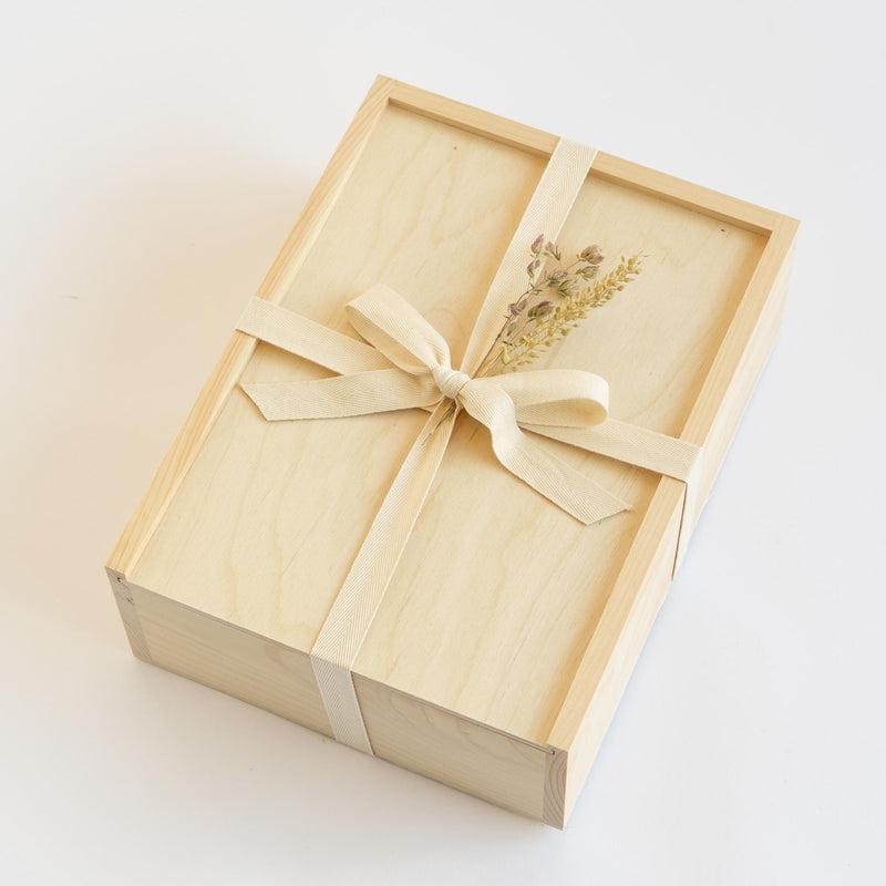 Santa Barbara Company Sustainable Wood Gift Box, exterior tied with ribbon